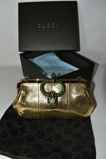 GUCCI EVENING BAG, ENAMELED CRYSTAL SNAKE HEAD CLASP: GUCCI EVENING BAG, ENAMELED CRYSTAL SNAKE HEAD CLASP, ORIGINAL INVOICE TO PREVIOUS OWNER WITH GUCCI PAPERS, AN EXTREMELY RARE AND UNUSUAL TYPE, 1984