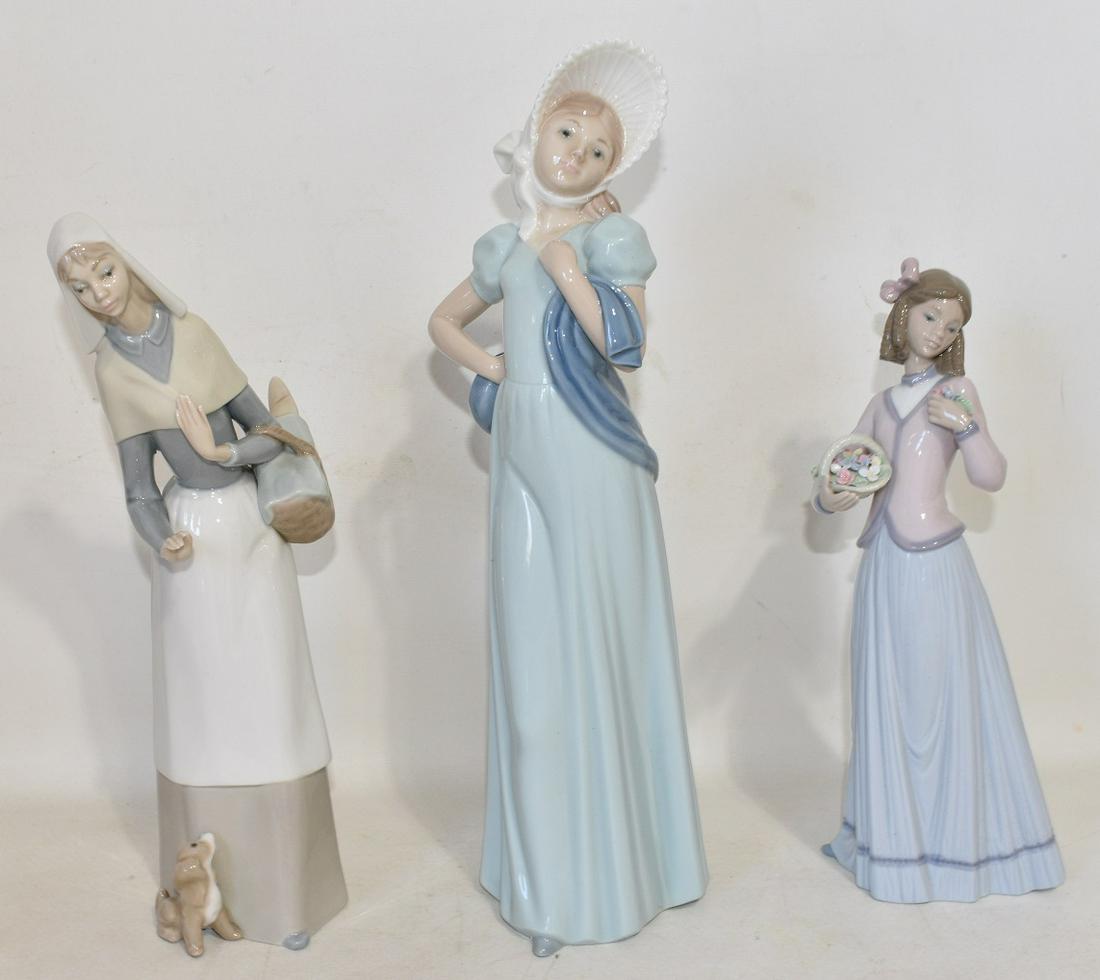 (3) LLADRO INNOCENCE IN BLOOM/DAMA AIROSA/LADY W/BASKET: (3) LLADRO INNOCENCE IN BLOOM #7644, H. 9 1/2" /DAMA AIROSA #289, H. 12 3/4" / LADY W/ BASKET & DOG, H. 10 1/2", 2 WITH ORIGINAL BOXES