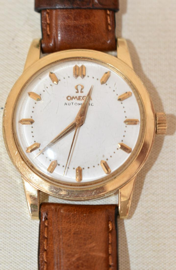 FINE MODERN OMEGA 14KT YW. GOLD WRISTWATCH W/ ALLIGATOR: FINE MODERN OMEGA 14KT YELLOW GOLD WRISTWATCH W/ ALLIGATOR BAND, C. 1960, MEASURES 34.51MM WITHOUT CROWN