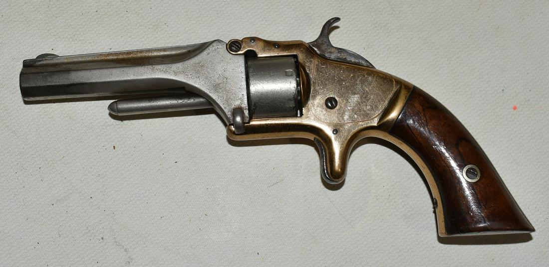 SMITH & WESSON 7 SHOT POCKET REVOLVER W/BRASS FRAME: SMITH & WESSON 7 SHOT POCKET REVOLVER W/BRASS FRAME & NICKEL CYLINDER & BARREL, C. 1860, BBL 3", SER. #56700 **NICS CHECK REQUIRED**