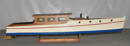 VINTAGE STREAMLINED WOOD BOAT, C. 1950/60