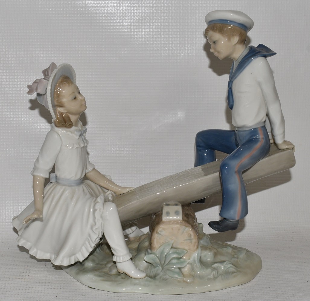 LLADRO SEASAW PORCELAIN FIGURINE: LLADRO SEASAW PORCELAIN FIGURINE, H. 10" L. 12"