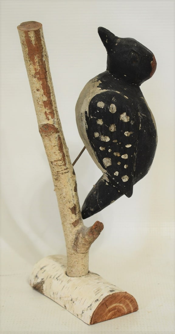 FOLK ART CARVED/PAINTED WOODPECKER ON BIRCH TREE: FOLK ART CARVED/PAINTED WOODPECKER ON BIRCH TREE BRANCHES, C. 1930/40, H. 10" W. 4"