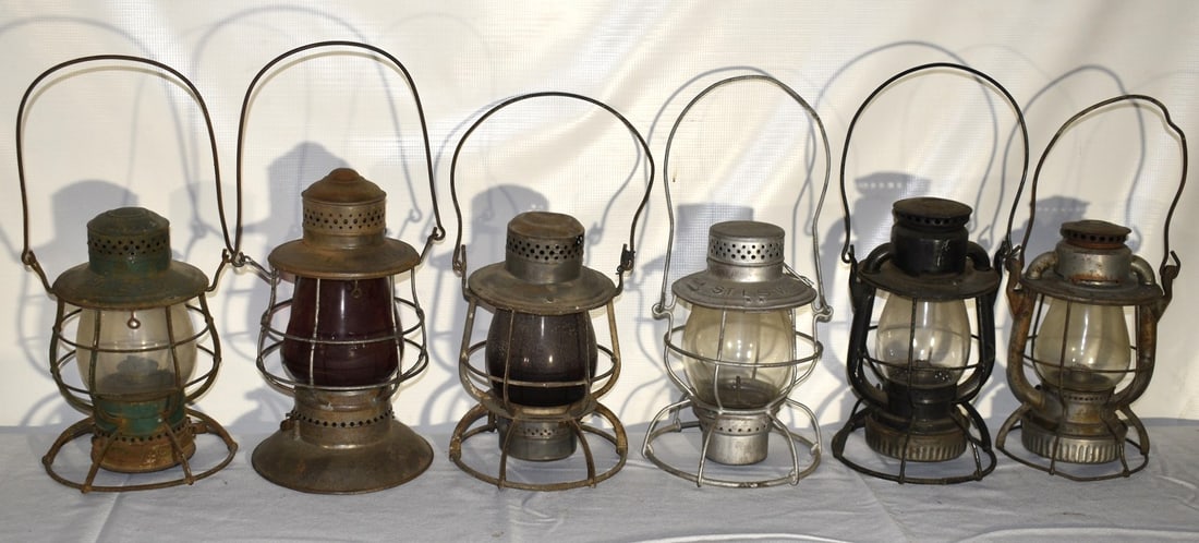 6 RR LANTERNS INCL. FITCHBURG, S.T.L.S.W, ERIE, MAINE: LOT (6) EARLY RAILROAD LANTERNS INCL. FITCHBURG, LIRR, S.T.L.S.W, ERIE, MAINE CENTRAL, WABASH, 19/20TH C.