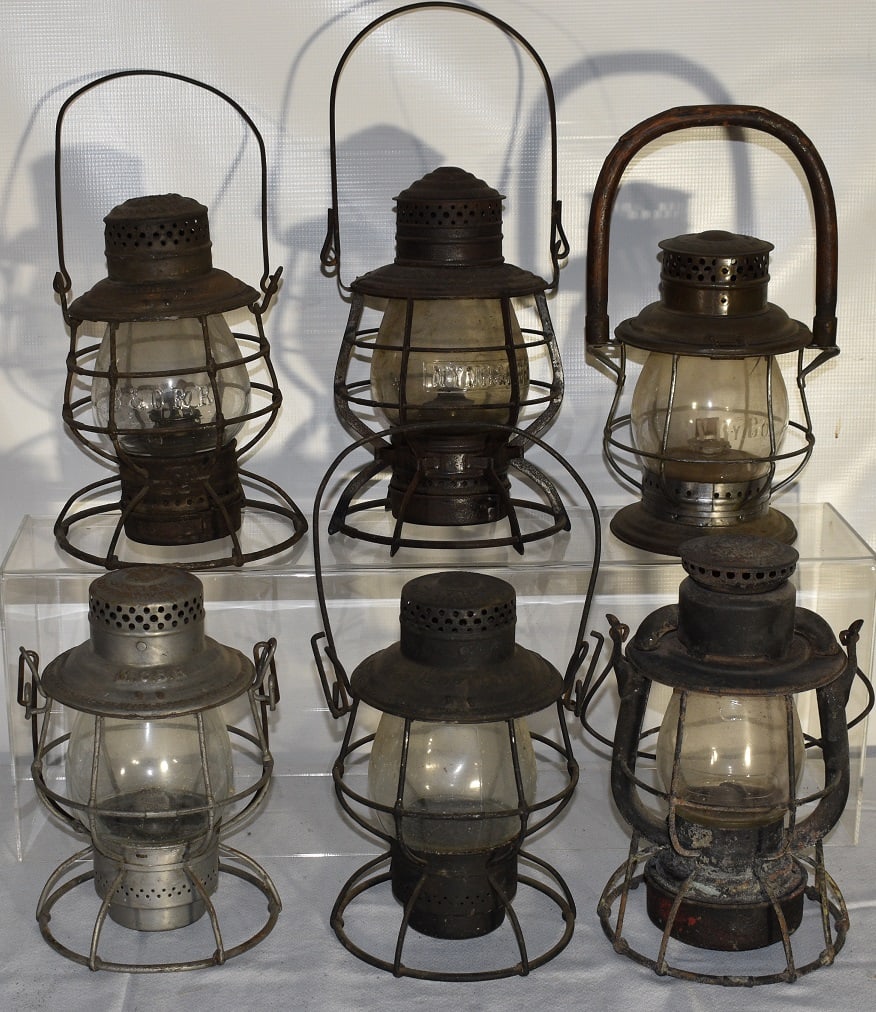6 RR LANTERNS INCL. C.V. RY. CO., L.S. & M.S. RY., C.N.: LOT (6) EARLY RAILROAD LANTERNS INCL. C.V. RY. CO., NY O & W, L.S & M.S. RY., C.N., M.C., NY NH & H, 19/20TH C.