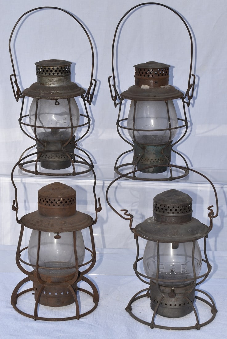 4 PENNSYLVANIA RR LANTERNS INCL. CLEAR & CAST GLOBES: LOT (4) PENNSYLVANIA RAILROAD LANTERNS INCL. CLEAR & CAST GLOBES