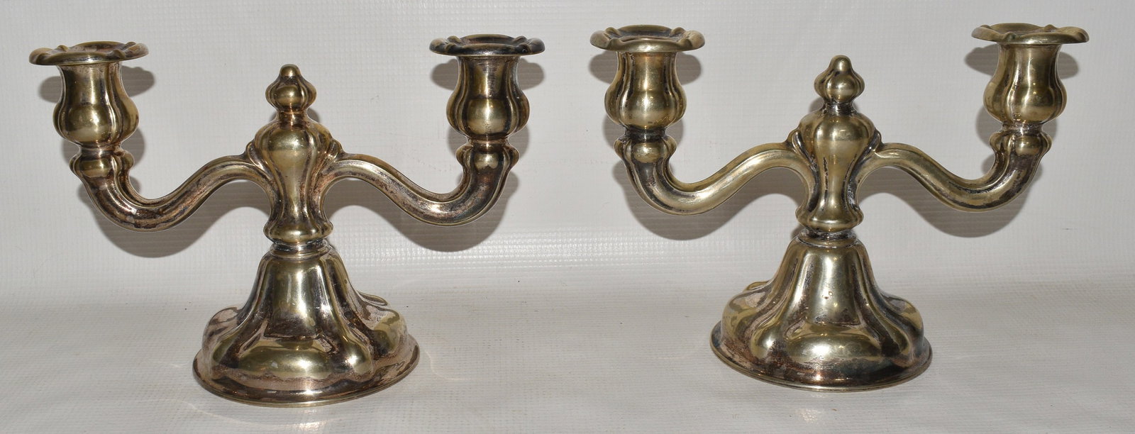 PAIR CLASSICAL COIN SILVER CANDLE STICKS, C. 1950: PAIR CLASSICAL COIN SILVER CANDLE STICKS, C. 1950, H. 6" W. 9"