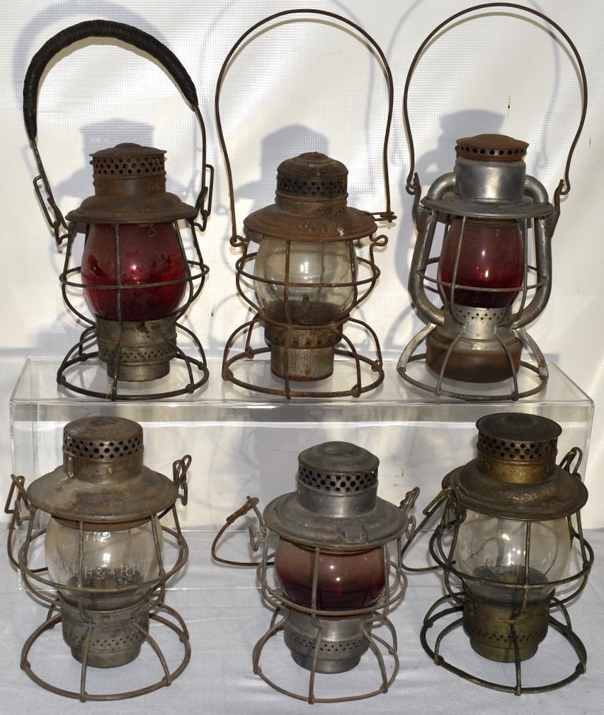 6 EARLY RR LANTERNS INCL. B & A, MONON, C & W.I., F.W.: LOT (6) EARLY RAILROAD LANTERNS INCL. B & A, MONON, NY NH & H, C & W.I., F.W. & D.C., P.S. RY., 19/20TH C.