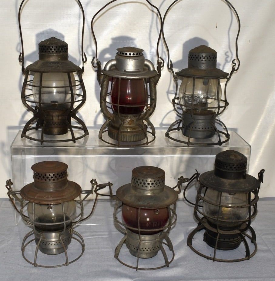 6 EARLY RR LANTERNS INCL. LIRR, L.C. & N. CO., ERIE, L.V: LOT (6) EARLY RAILROAD LANTERNS INCL. LIRR, L.C. & N. CO., ERIE, L.V., ERIE RR CO., B.R & P. RY., 19/20TH C.