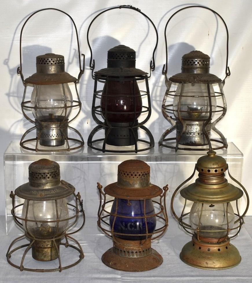 6 EARLY RR LANTERNS INCL. W & LE, NYC, COLO. MID, L.V.: LOT (6) EARLY RAILROAD LANTERNS INCL. W & LE, NYC, COLO. MID, L.V., D & R.G, CONDUCTORS, 19/20TH C.