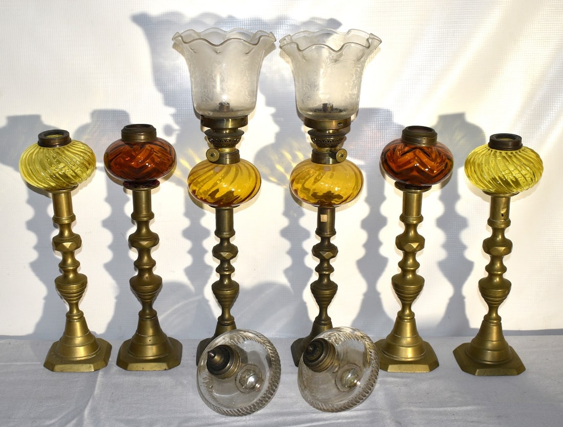 8 VICT. BRASS/GLASS KEROSENE CANDLESTICK TABLE LAMPS: LOT (8) EARLY VICTORIAN BRASS/GLASS KEROSENE CANDLESTICK TABLE LAMPS, 19TH C., H. 14 1/2"