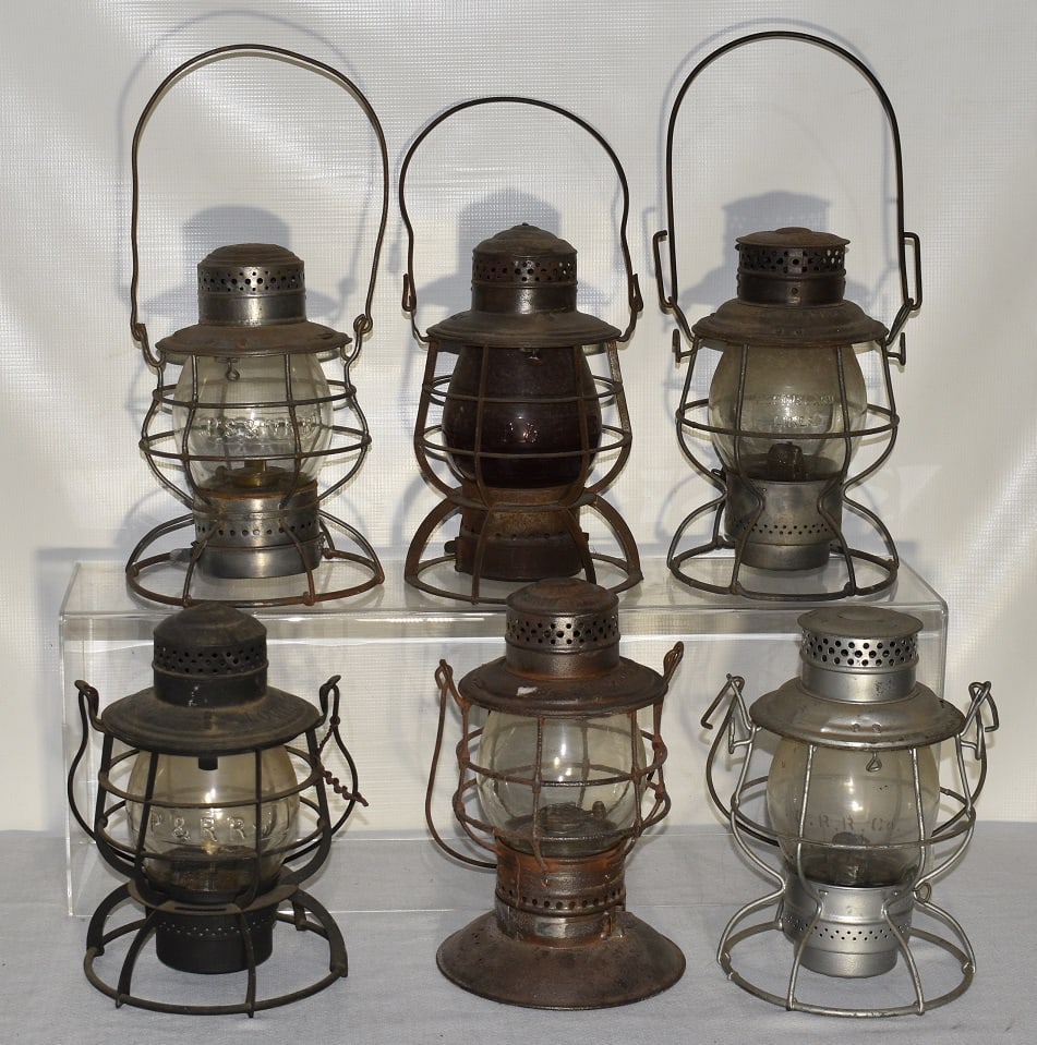 6 RR LANTERNS INCL. P & R, P&R LOCO DEPT., C.A. & C. RY: LOT (6) EARLY RAILROAD LANTERNS INCL. P & R, P & R LOCO DEPT., C.A. & C. RY., P.S. & N, ROCK ISLAND LINES, 19/20TH C.