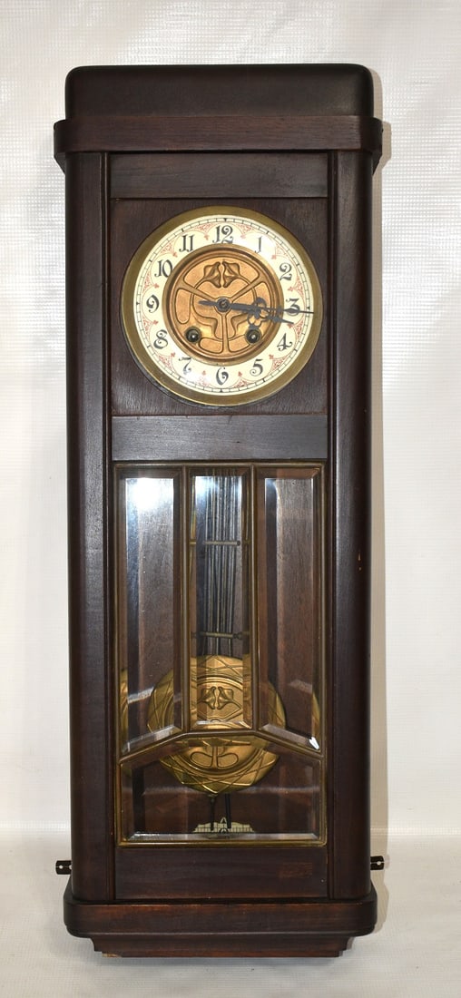 MISSION STYLE WALNUT WALL CLOCK, 19/20TH C.: MISSION STYLE WALNUT WALL CLOCK, 19/20TH C., H. 26"