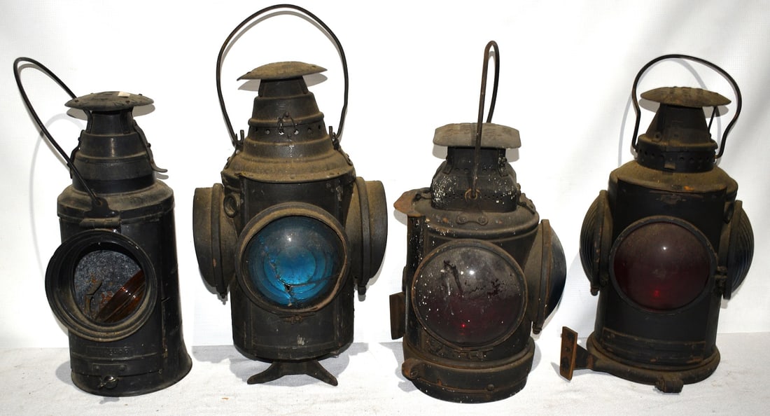 4 RR SWITCH/BRAKEMANS LANTERNS INCL. NY NH & HR, D & H: LOT (4) EARLY RAILROAD SWITCH/BRAKEMANE LANTERNS INCL. NY, NH & HRR, D & H CO., ERIE RR, 19TH C.