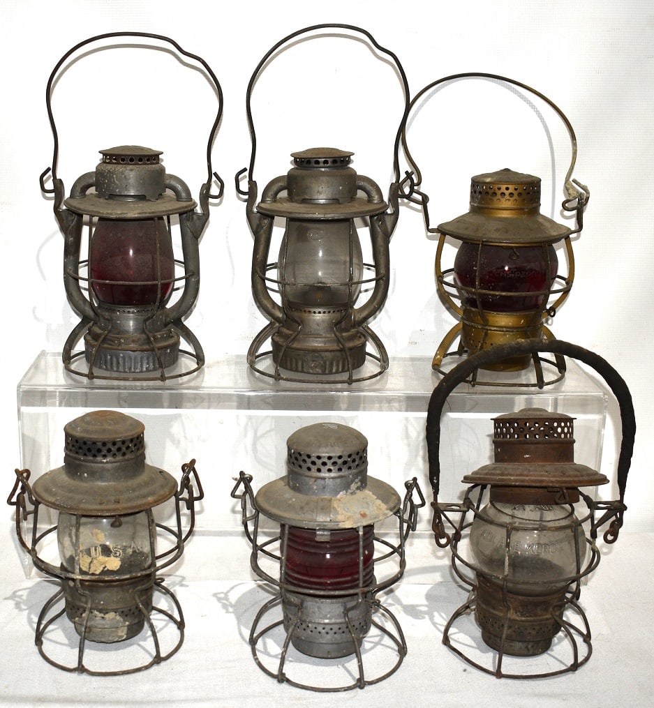 6 RR LANTERNS INCL. ERIE, CRR OF NJ, CM St P & P, MAINE: LOT (6) RAILROAD LANTERNS INCL. ERIE, CRR OF NJ, CMSTP & PRR, MAINE CENTRAL, 20TH C.