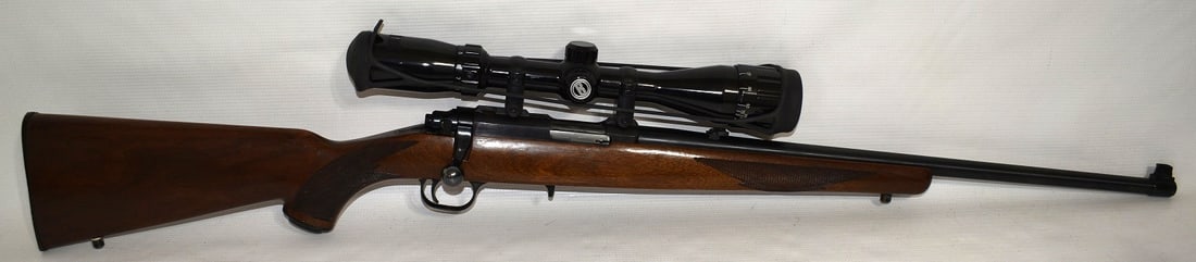 RUGER 77/22 CAL. BOLT ACTION RIFLE W/BUSHNELL SCOPE: RUGER 77/22 CAL. BOLT ACTION RIFLE W/BUSHNELL SPORTSMAN 4 X 12 SCOPE, SERIAL #700-20972 **NICS CHECK REQUIRED**
