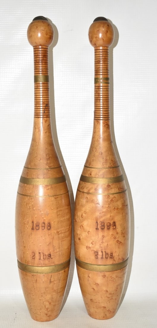 PAIR EARLY CURLY MAPLE INDIAN CLUBS, 19TH C. (1 of 9)