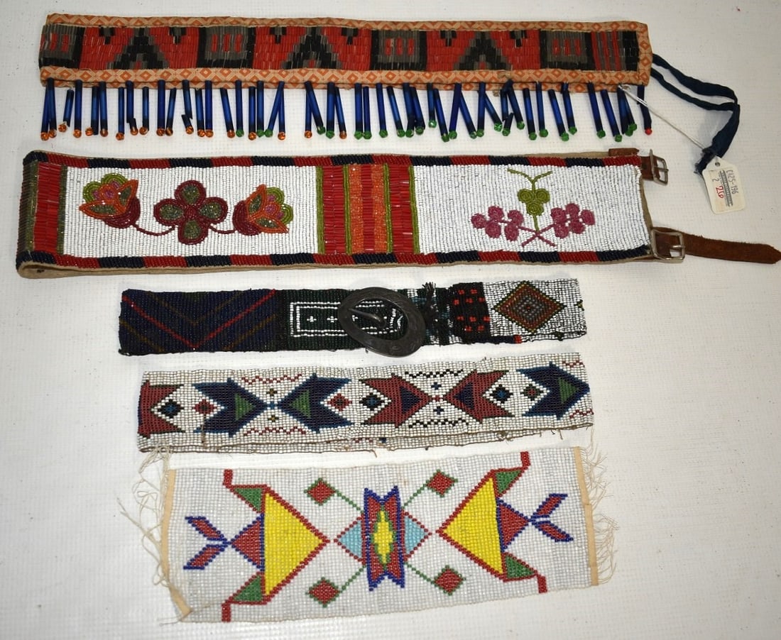 LOT (5) AMERICAN INDIAN BEADED DEERSKIN BELTS, ETC.: LOT (5) AMERICAN INDIAN BEADED DEERSKIN BELTS, ETC., 19/20TH C., L. LARGEST 34"