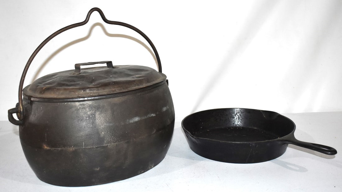 (2) EARLY CAST IRON FIREPLACE POTS, 19TH C. (1 of 4)