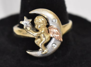CONTEMP. 14KT YW/WH GOLD ANGEL RING W/SINGLE CUT DIAM.