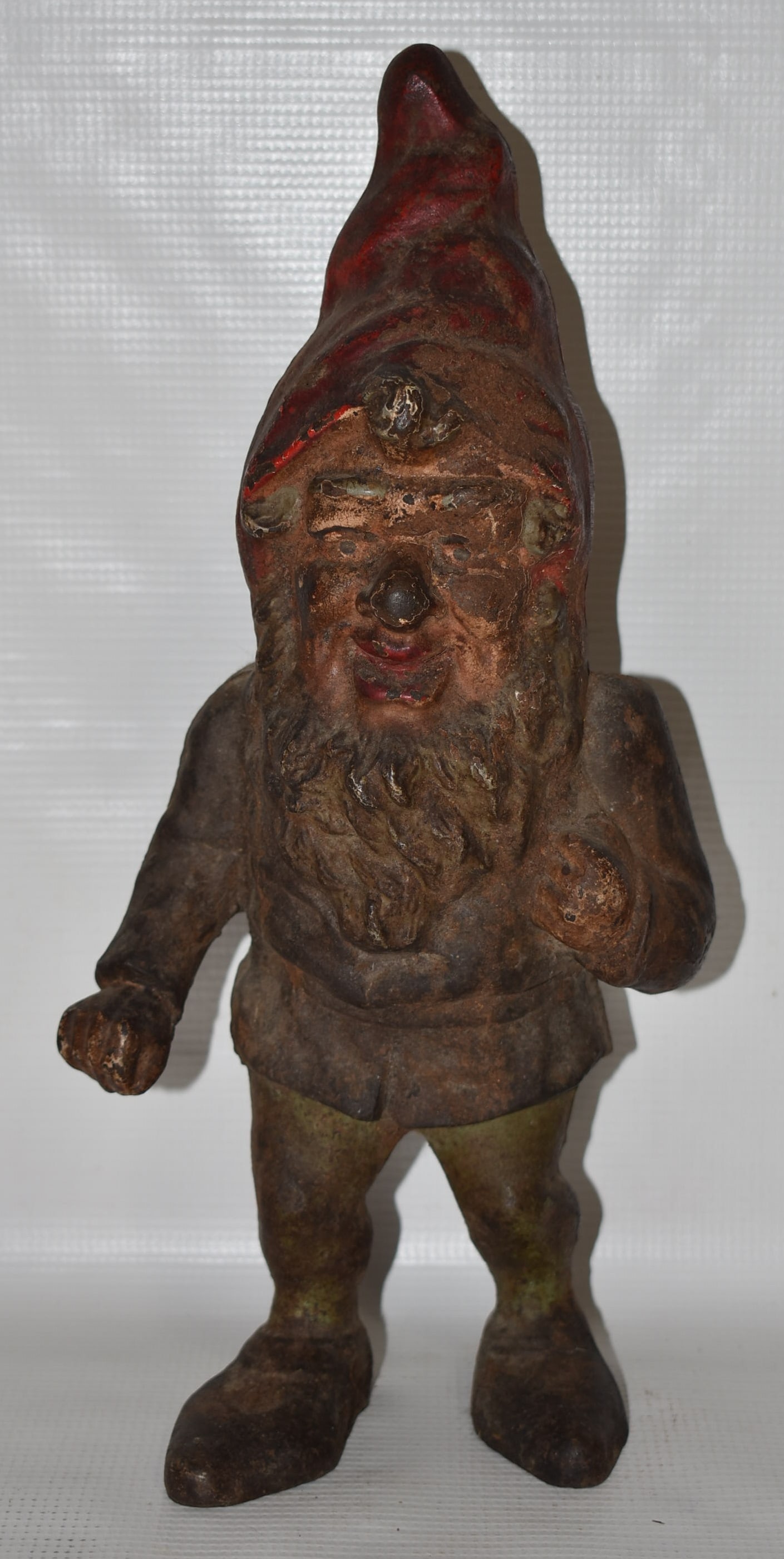RARE VICT./DECO GNOME CAST IRON DOOR STOP, 19/20TH C.: RARE VICTORIAN/DECO GNOME CAST IRON DOOR STOP, 19/20TH C., H. 14"