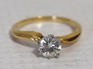 14KT YW. GOLD DIAMOND ENGAGEMENT RING WITH 1/2 CT DIAM.