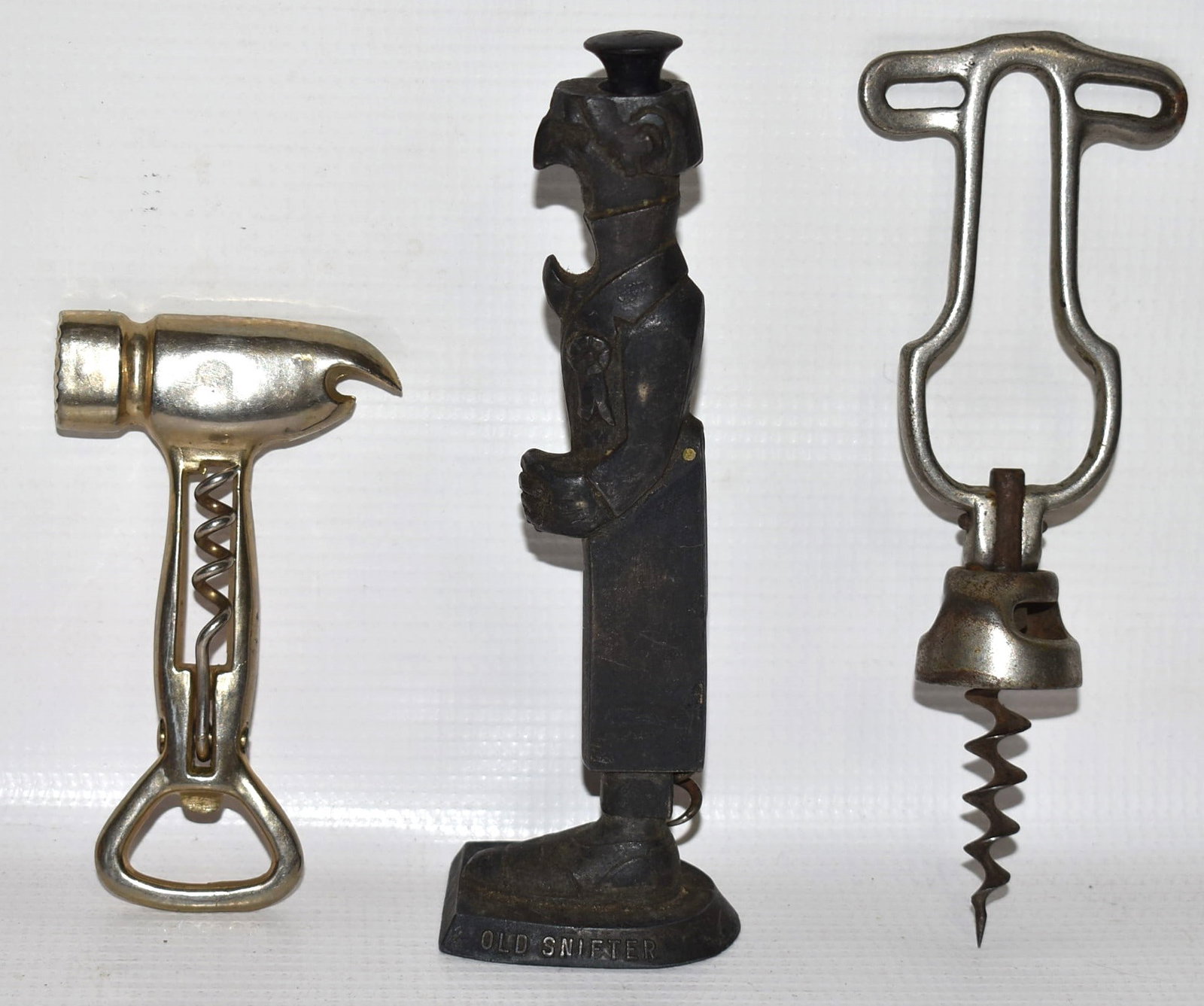 3 VINTAGE INCL ART DECO FIGURAL WINE BOTTLE CORK SCREWS: LOT (3) VINTAGE INCL. ART DECO FIGURAL WINE BOTTLE CORK SCREWS, 20TH C., H. TALLEST 6 1/4"
