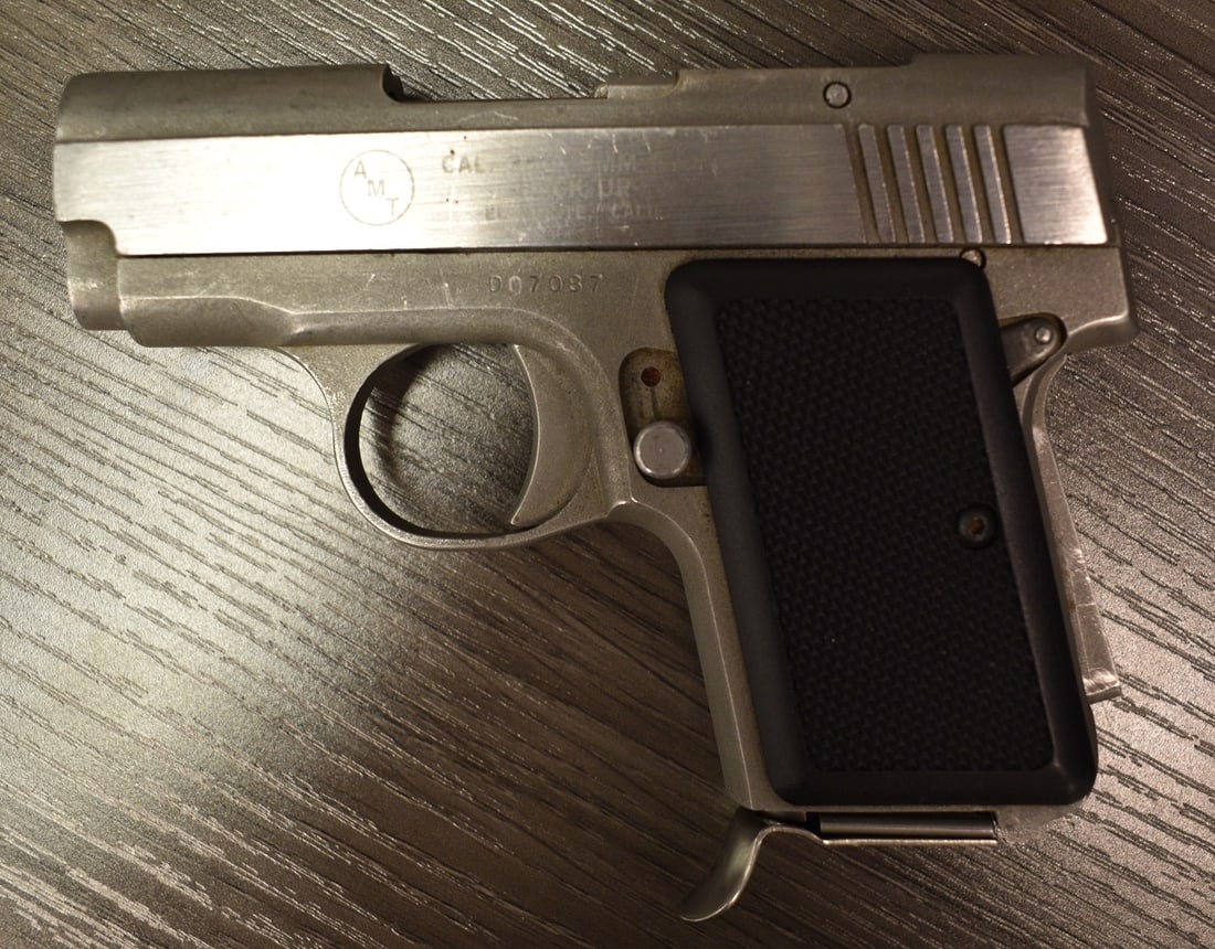 A.M.T. 380 CAL. SEMI-AUTOMATIC PISTOL, EL-MONTE CAL.: A.M.T. 380 CAL. SEMI-AUTOMATIC PISTOL, EL-MONTE CAL., SERIAL #D07087 **NICS CHECK REQUIRED**