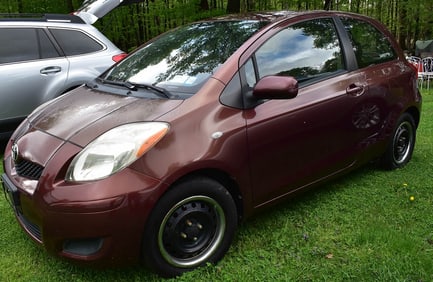 2009 TOYOTA YARIS 2 DOOR SEDAN 4 SPEED, 26,353 MILES