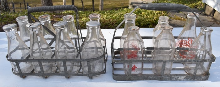 ASSORTED MILK BOTTLES W/2 CARRIER RACKS, 19/20TH C.