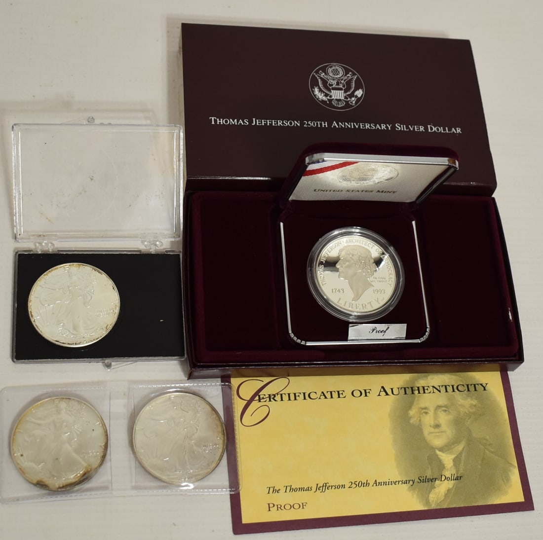 LOT (4) SILVER EAGLES/JEFFERSON, 1990, 1991, 1993, 1999: LOT (4) SILVER EAGLES/JEFFERSON, 1990, 1991, 1993, 1999