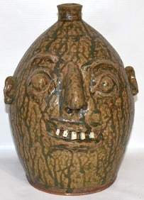 FOLK ART POTTERY FACE JUG SIGNED MARVIN BAILEY, 20TH C.