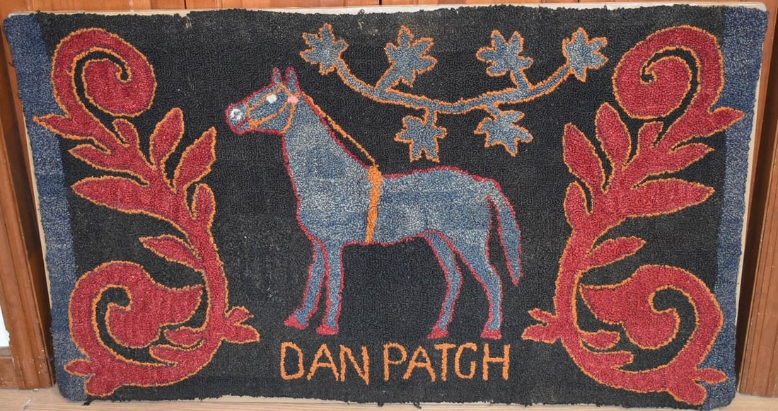 FOLK ART "DAN PATCH" HOOKED RUG (MOUNTED) 19/20TH C.: FOLK ART "DAN PATCH" HOOKED RUG (MOUNTED) 19/20TH C., 27" X 46"