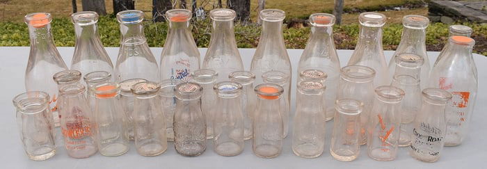 LARGE LOT ASSORTED ADVERTISING MILK BOTTLES, 19/20TH C.
