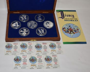 7 ASST. .999 PURE SILVER DISNEY AROUND THE WORLD COINS