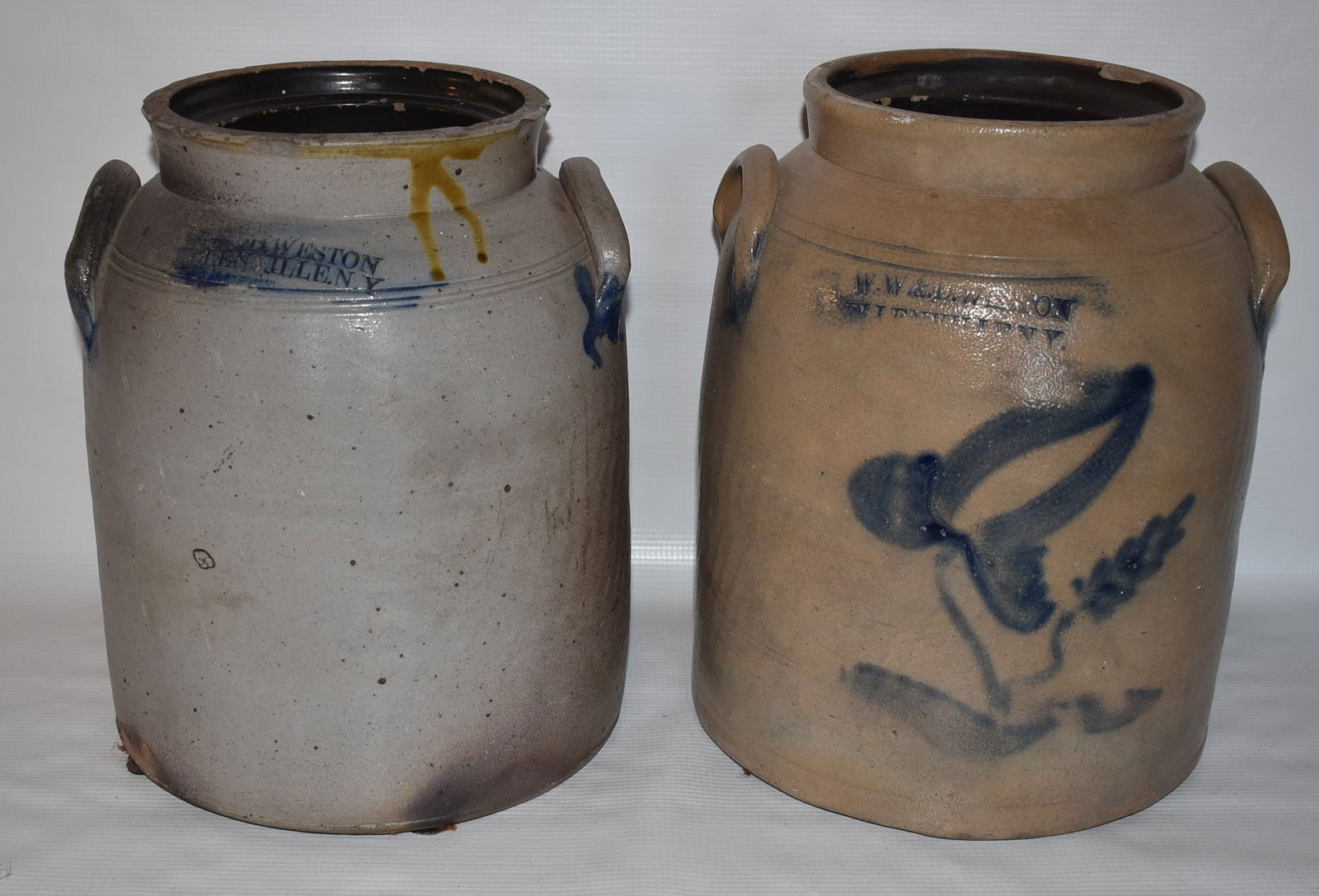 2 W.W & D. WESTON 2 GAL. SALT GLAZED BUTTER CHURNS: LOT (2) W.W & D. WESTON 2 GAL. SALT GLAZED STONEWARE BUTTER CHURNS W/COBALT DECORATION, 19/20TH C.