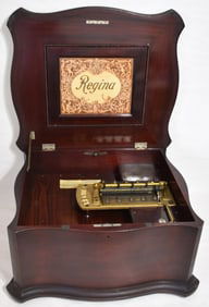 REGINA ROUND DISK MUSIC BOX W/14 DISKS (16"), 19TH C.