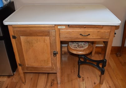 MUTSCHLER BROS ENAMEL TOP KITCHEN CABINET, C. 1920'S