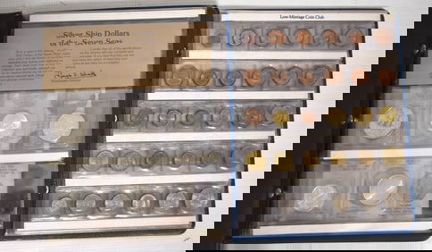 (2) COIN BOOKS INCL SILVER SHIP ROUND/LOW MINTAGE WORLD