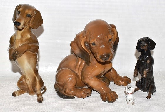 LOT (4) ROSENTHAL DOGS: LOT (4) ROSENTHAL DOGS: LARGE BROWN PUPPY SEATED; TALL BROWN DACHSHUND; STANDING DACHSHUND DARK BROWN; MINI WHITE DOG; TALLEST 7 1/2"