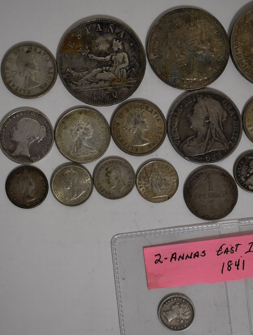 ASST FOREIGN SILVER COIN INCL. 1870 ESPANA FIVE PESETAS: LOT ASSORTED FOREIGN SILVER COIN INCL. 1870 ESPANA FIVE PESETAS, 1939 NEDERLANDEN 2 1/2 GULDEN, CANADIAN SILVER, RARE 1841 TWO ANNAS EAST INDIA TRADING COMPANY VICTORIA