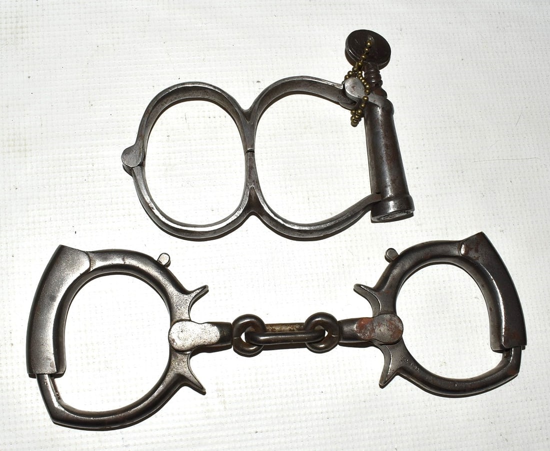 (2) EARLY HANDCUFFS INCL. SHACKLE TYPE W/KEY, 19TH C. (1 of 6)