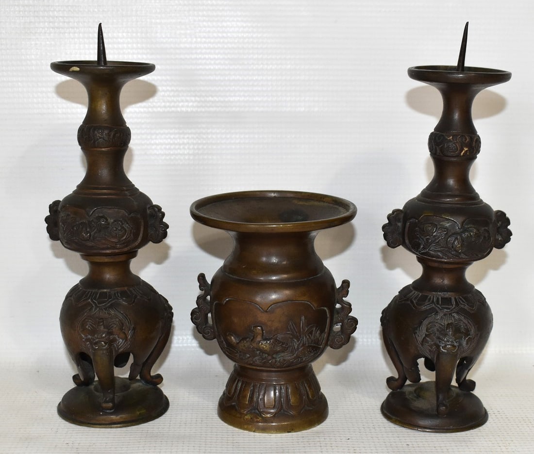 SET (3) CHINESE BRONZE ALTAR ITEMS: SET (3) CHINESE BRONZE ALTAR ITEMS INCLUDING (2) BRONZE CANDLE PRICKETS AND CENTER CENSER VASE W/ SAND CAST INTERIOR, 19TH C., H. 8 1/2"