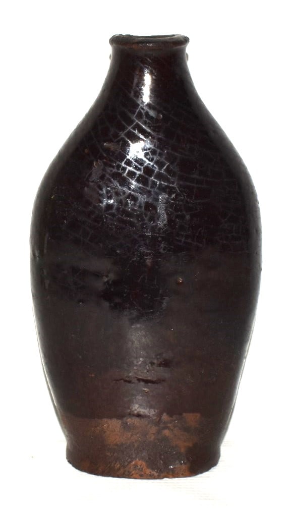 FINE REDWARE CHOCOLATE GLAZED POCKET FLASK 19TH C.: FINE REDWARE CHOCOLATE GLAZED POCKET FLASK 19TH C. H 7 1/2".