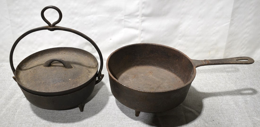 LOT (2) VERY EARLY CAST IRON FIREPLACE POTS, 18TH C.: LOT (2) VERY EARLY CAST IRON FIREPLACE POTS, 18TH C.