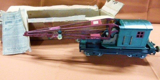 Vint. Standard Gauge Lionel Train Electric Crane c1920: Vintage Standard Gauge Lionel Trains - Electric Crane c 1920 In Original Box w/ Paperwork+ 3 boxes of track, fencing, 6 trains & engine.(with Wheel Issues) Condition: Good condition, box has wear and 