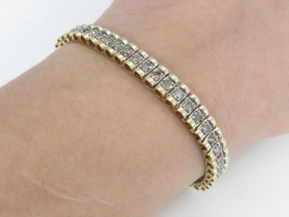 CONTEMPORARY 10KT TENNIS BRACELET W/ DIAMONDS (1 of 4)