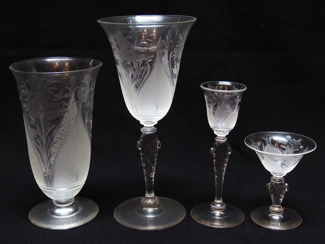 LOT (35) STEUBEN WHEEL ETCHED DINNER GLASSWARE C1910/20: LOT (35) STEUBEN WHEEL ETCHED DINNER GLASSWARE SIGNED BLOCK LETTERS C 1910/20, 10 Lg. WATERS H.6 1/4", 7 Lg. WINES H.8", 7 LONG STEM CORDIALS H. 5 1/2", 11 SHORT CORDIALS H. 3 1/4"