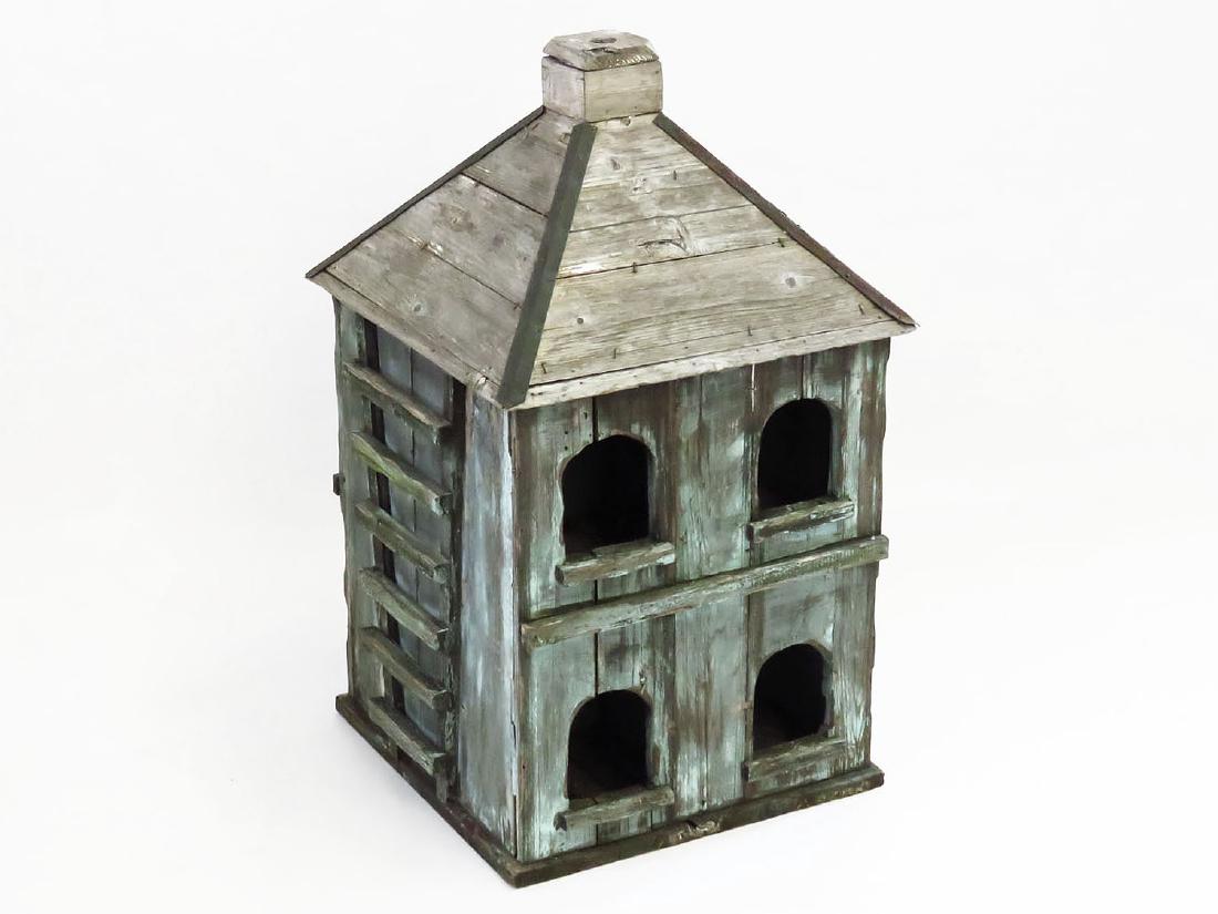 FOLK ART PURPLE MARTIN BIRD HOUSE, ROBINS EGG BLUE 1930: FOLK ART PURPLE MARTIN BIRD HOUSE W/ TRACES OF ROBINS EGG BLUE PAINT C. 1930/40, H. 34" W. 21"