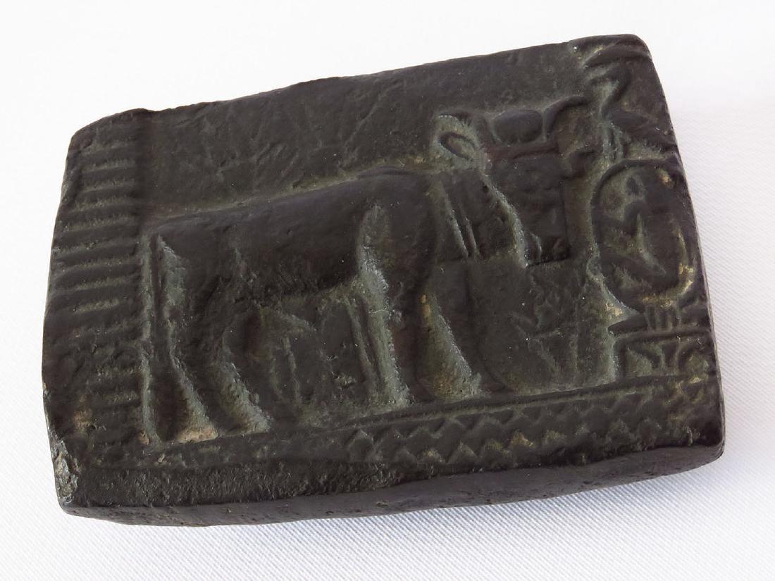 ANCIENT EGYPTIAN CARVED CLAY APIS/BULL 1390-1352 BCE: ANCIENT EGYPTIAN ARTIFACT,CARVED BLACKENED CLAY, SACRED BULL APIS; 1390-1352 BCE, 2 1/2" X 3 1/2"